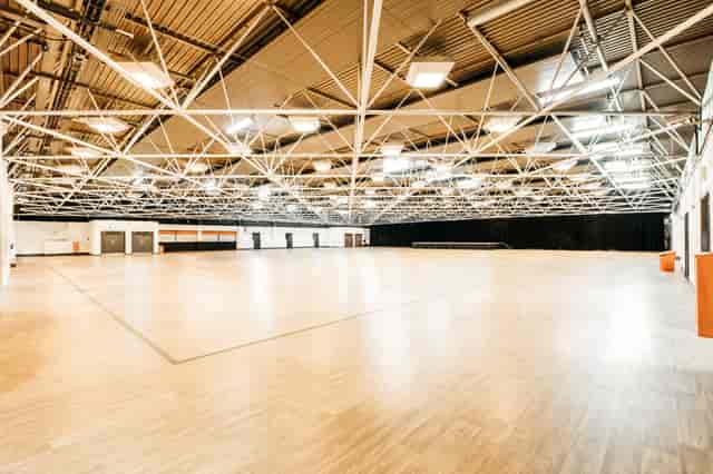 Spacious Byron Hall venue with high ceilings for conferences and exhibitions.