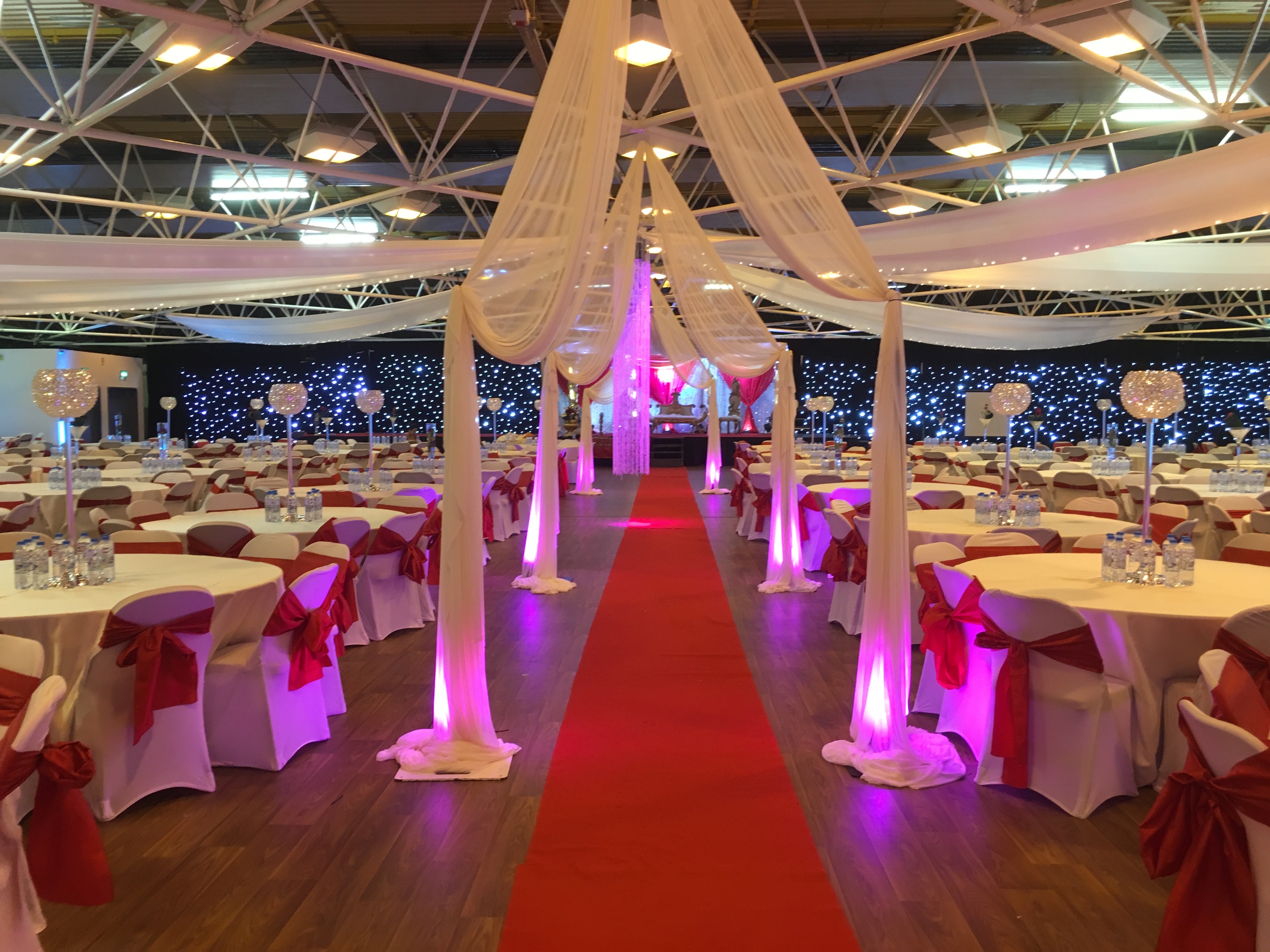 Elegant Byron Hall event space with red carpet, perfect for weddings and formal gatherings.