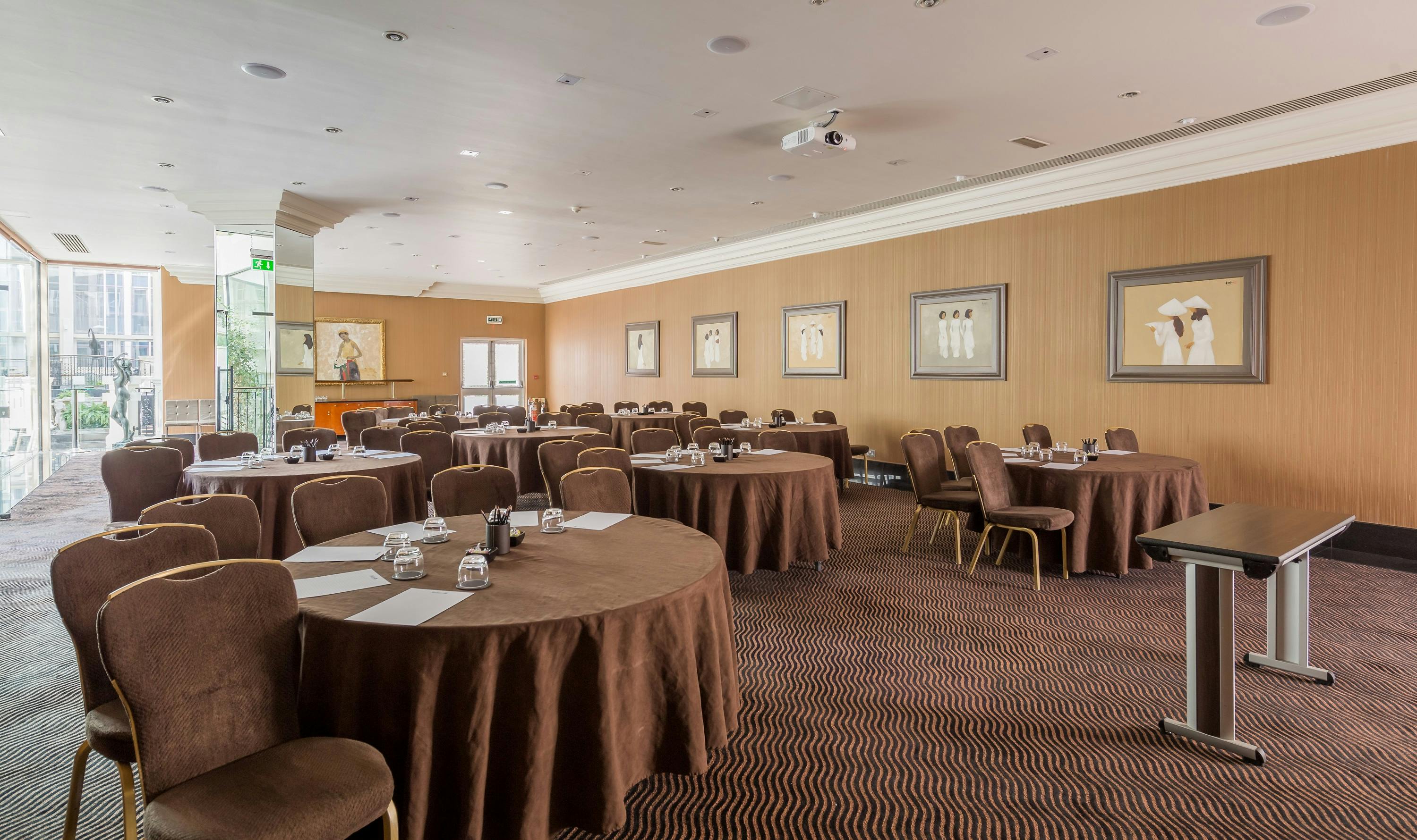 Newbury Suite 2 meeting room with round tables, ideal for workshops and seminars.