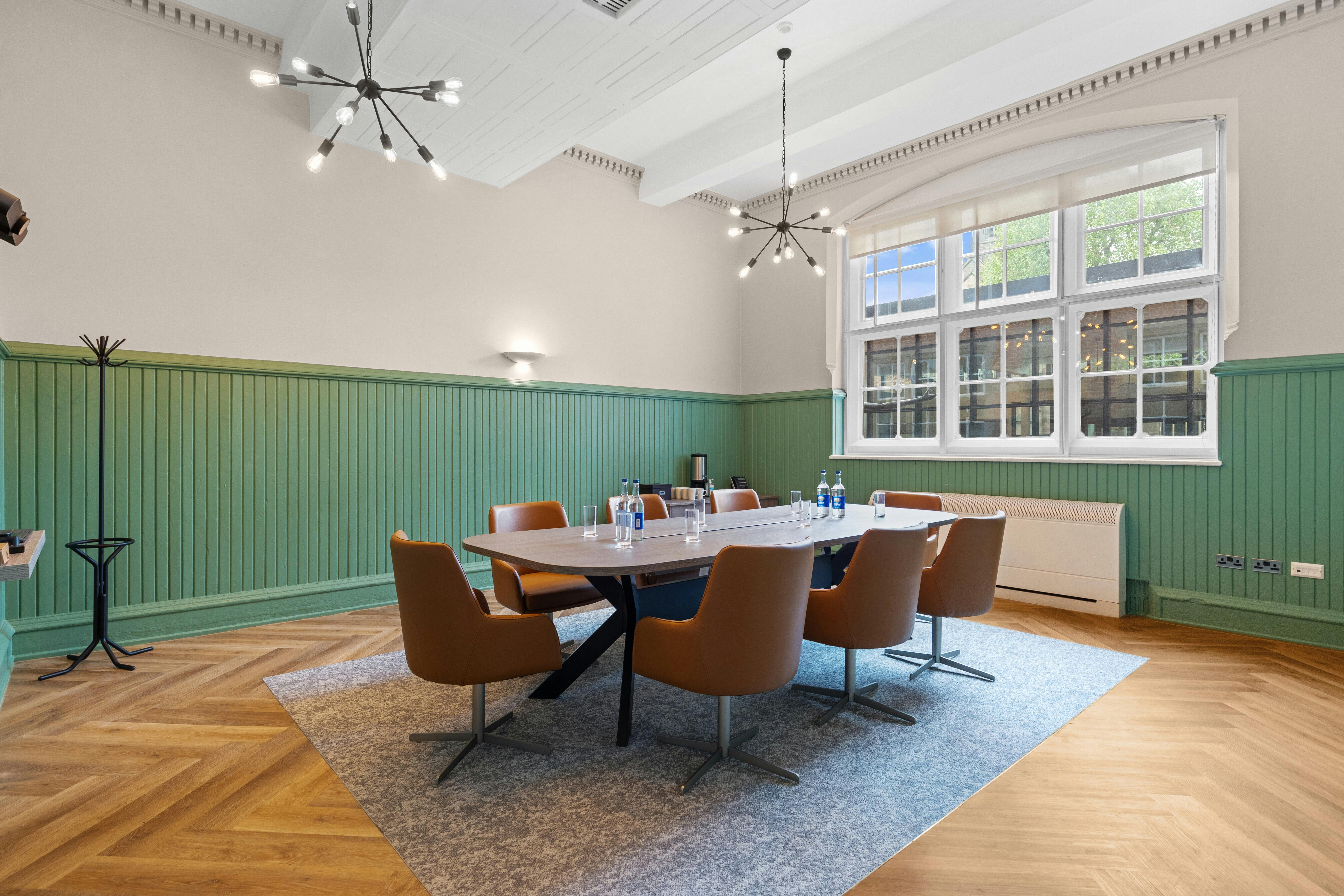 Bardsley Room at St Martins House: modern meeting space with natural light for events.