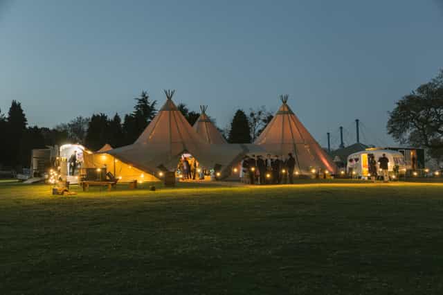 Illuminated tipis in Vanstone Park, ideal for weddings and outdoor events.