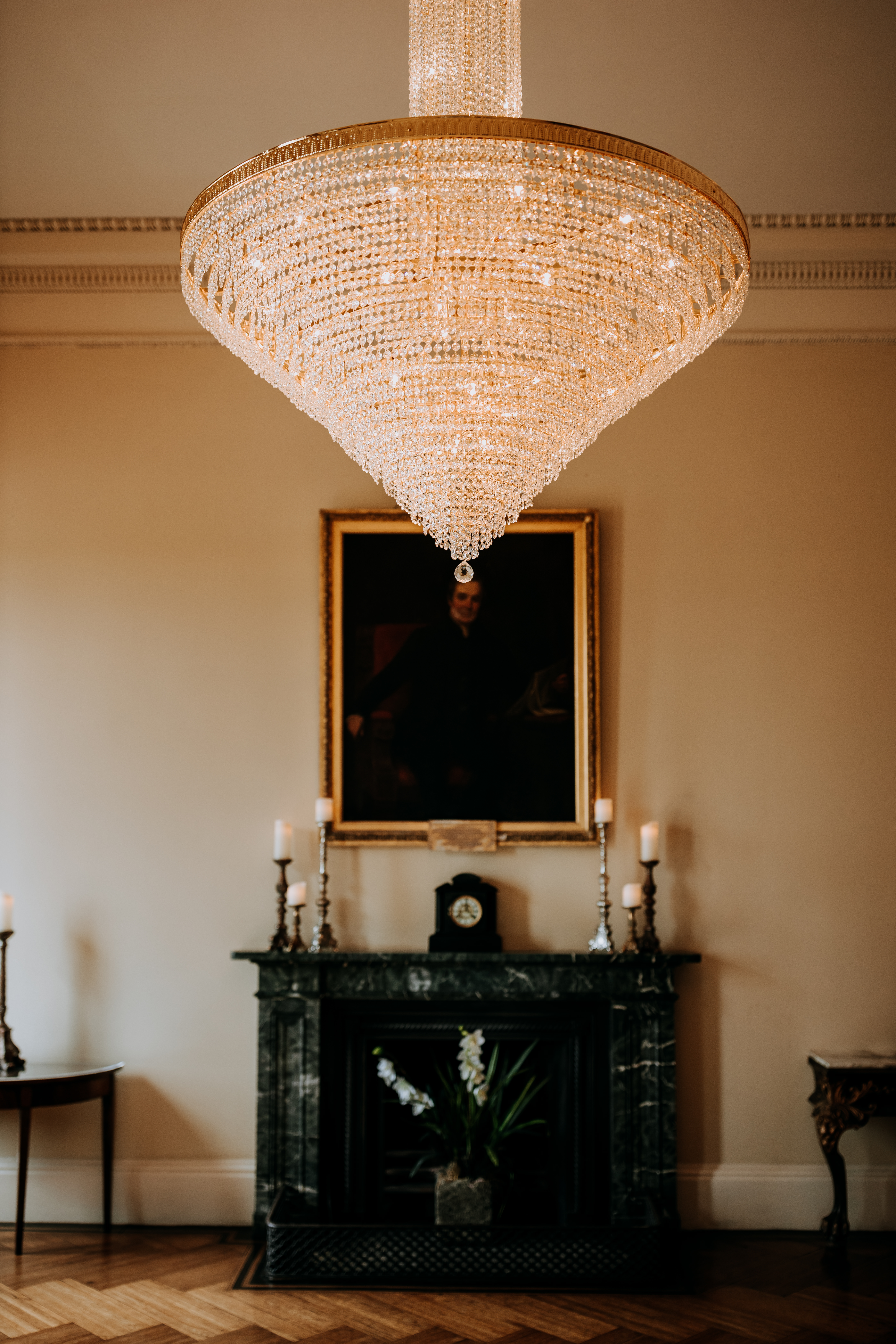 Elegant Rise Hall venue with chandelier, perfect for upscale events and intimate dinners. - Banner