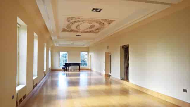 Long Gallery at Lauderdale House with piano, ideal for intimate wedding ceremonies and events.