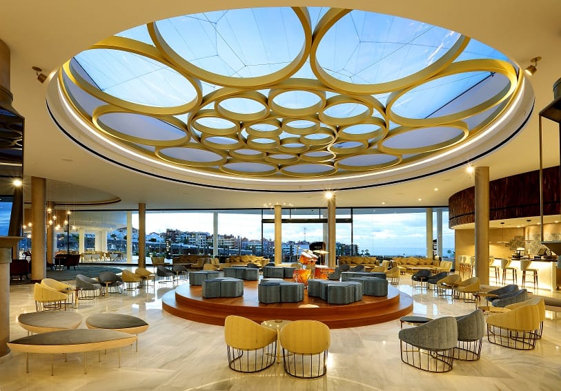 Modern event space at Hard Rock Hotel Tenerife with circular ceiling design for gatherings.