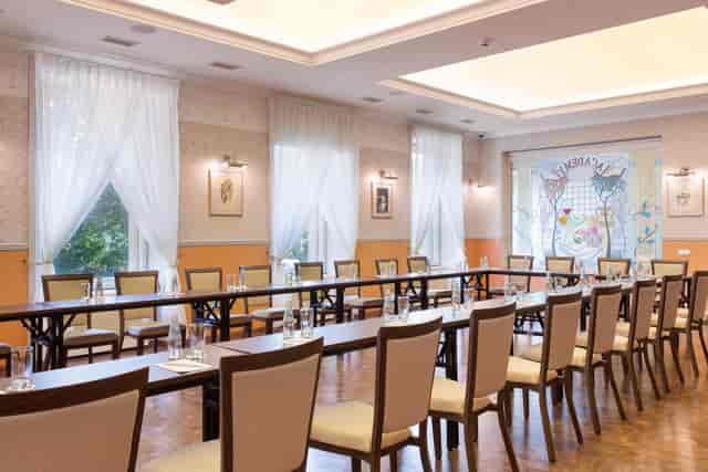 Meeting room at Radisson Hotel Riga with U-shaped tables for corporate events.