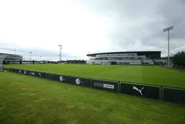 Spacious outdoor venue at City Football Academy for corporate events and gatherings.