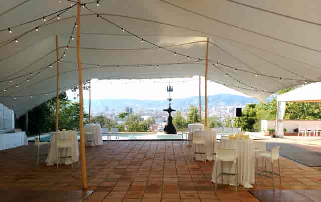 Elegant outdoor event space at Fundació Joan Miró with stunning views and modern seating.