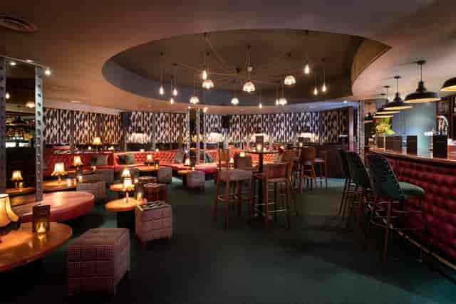 Main Hall Exclusive at All Star Lanes, cozy venue for cocktail receptions and networking events.