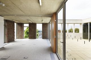 Beguine Terrace at ORTUS Venue: modern event space with large windows for meetings and gatherings.