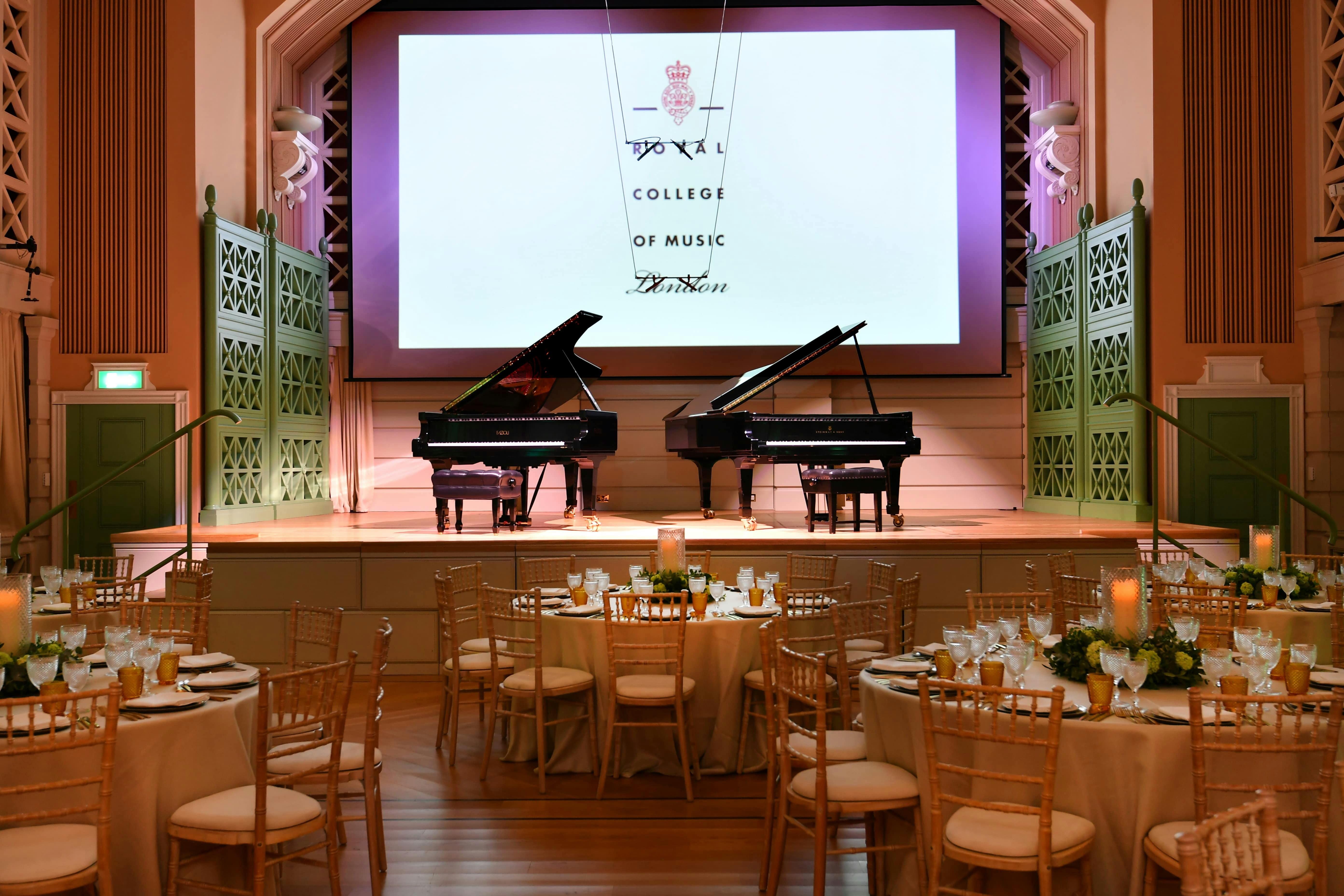 Performance Hall at Royal College of Music with grand pianos for a gala concert event.