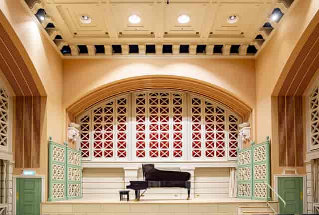 Performance Hall at Royal College of Music with grand piano, ideal for concerts and events.