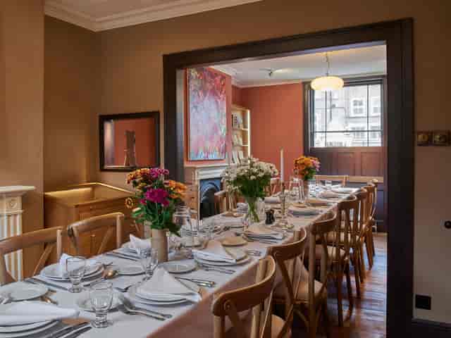Elegant dining table in Van Gogh House, perfect for intimate gatherings and events.