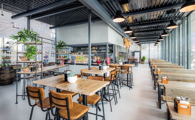 Modern dining venue at Sticky Fingers, ideal for meetings and events with natural light.