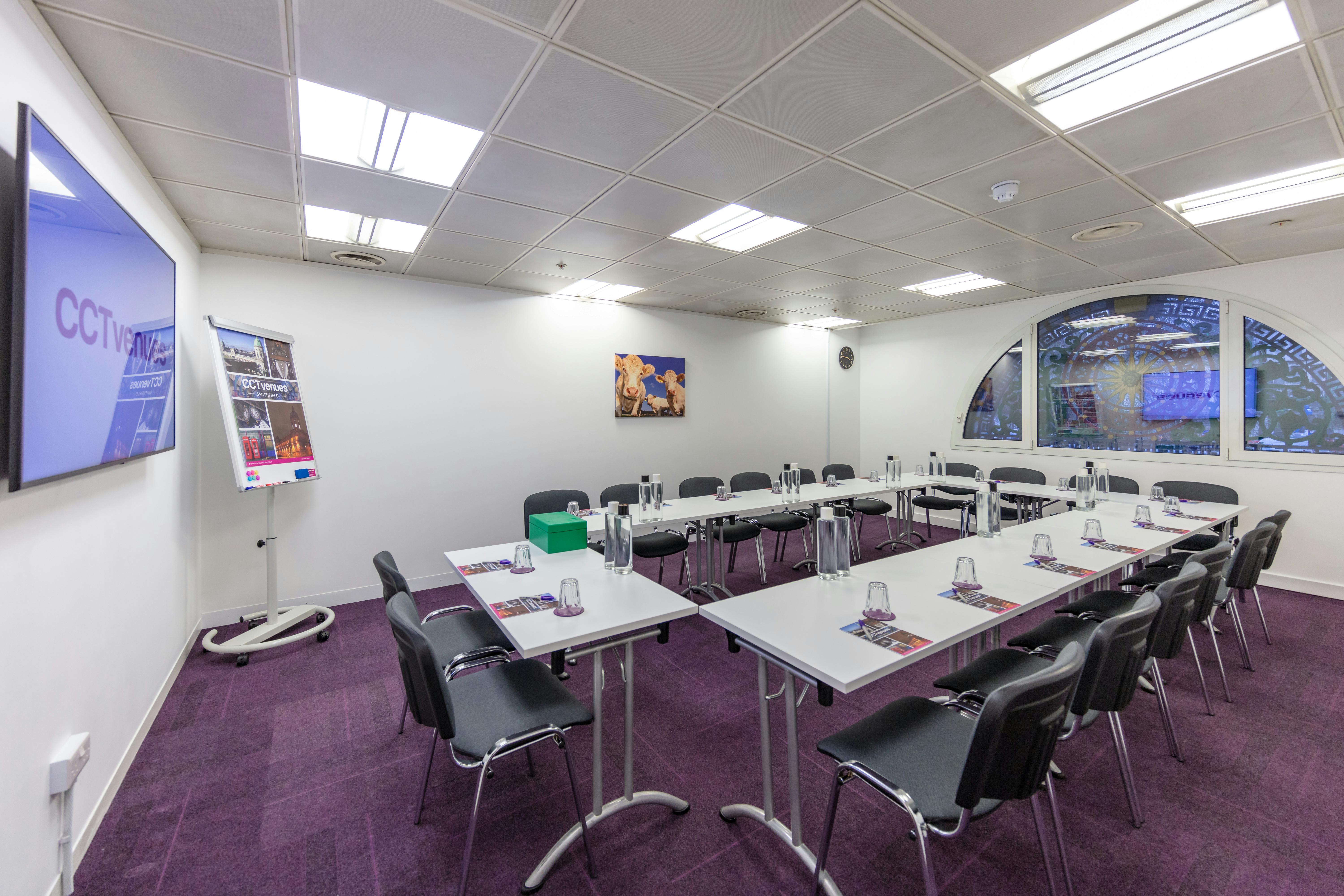 Meeting Room 3 at CCT Venues, featuring a long table and modern chairs for professional gatherings.