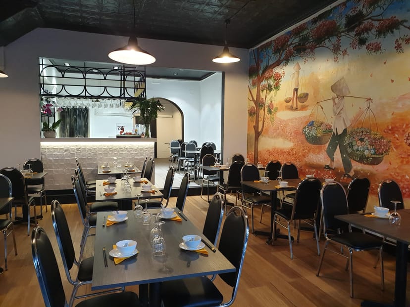 Main room at Phuong Restaurant with inviting layout, ideal for intimate events and meetings.