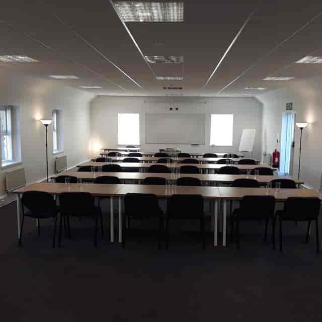 Conference room in North Yorkshire, set up for a workshop with natural light and collaboration.