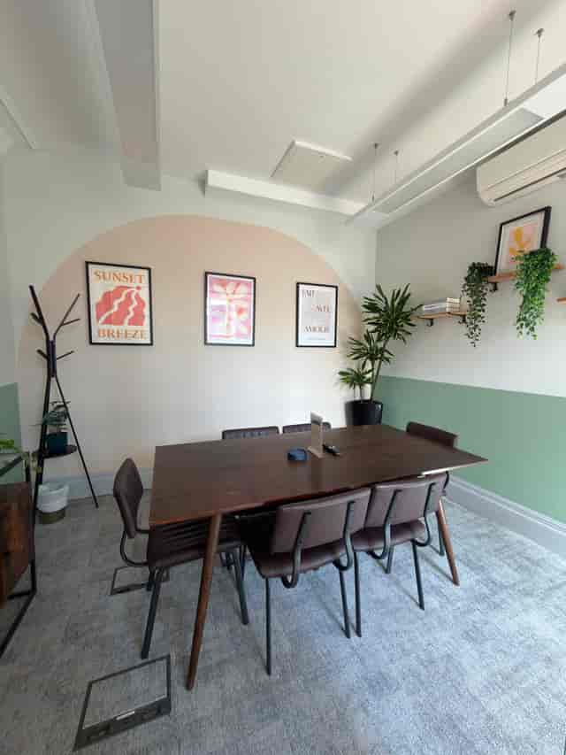 Cozy Wizu Workspace huddle room for team brainstorming and client meetings in The Leeming Building.