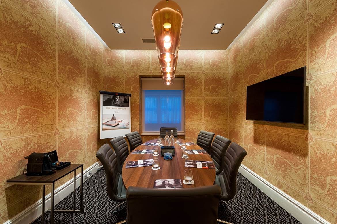 Hyde Suite meeting room with sleek table, ideal for corporate events and presentations.