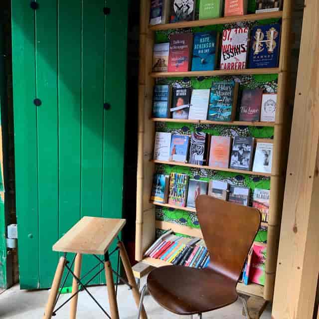 Cozy reading nook in Morocco Bound Bookshop, ideal for meetings and brainstorming sessions.