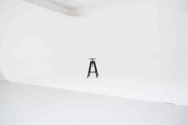 Minimalist Cove Studio setup with white backdrop for presentations and workshops.