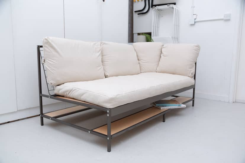 Modern minimalist sofa in Cove Studio, ideal for informal meetings and events.