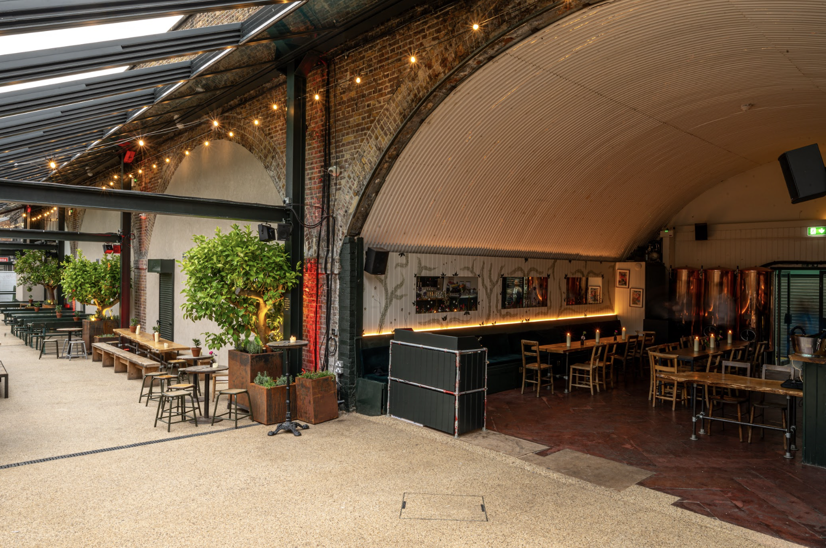 Versatile industrial-chic event space with exposed brick for gatherings and celebrations.