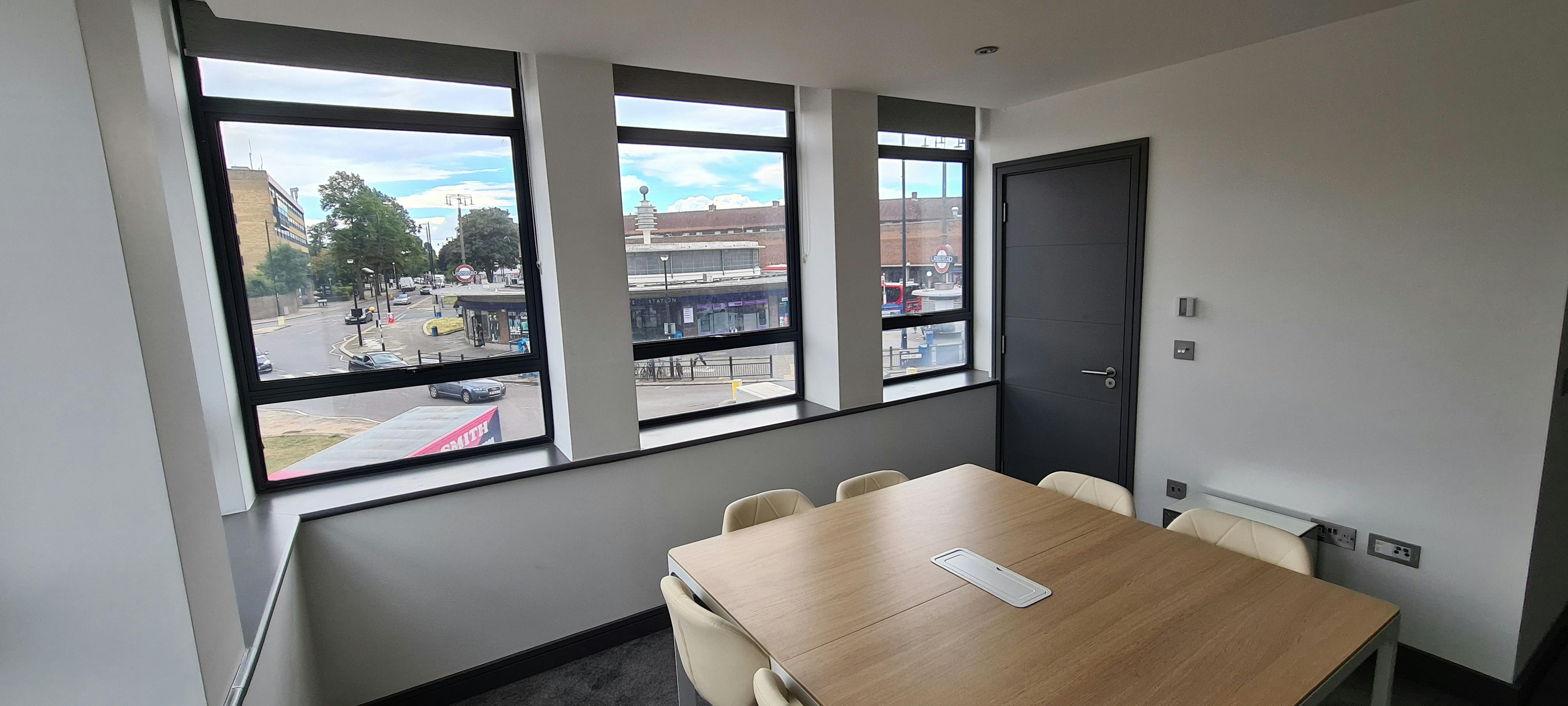 Modern Southpoint House meeting room with large windows for collaborative events.