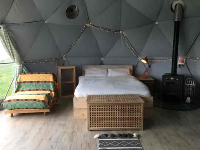 Cozy glamping setup with koa tree, perfect for retreats and team-building events.