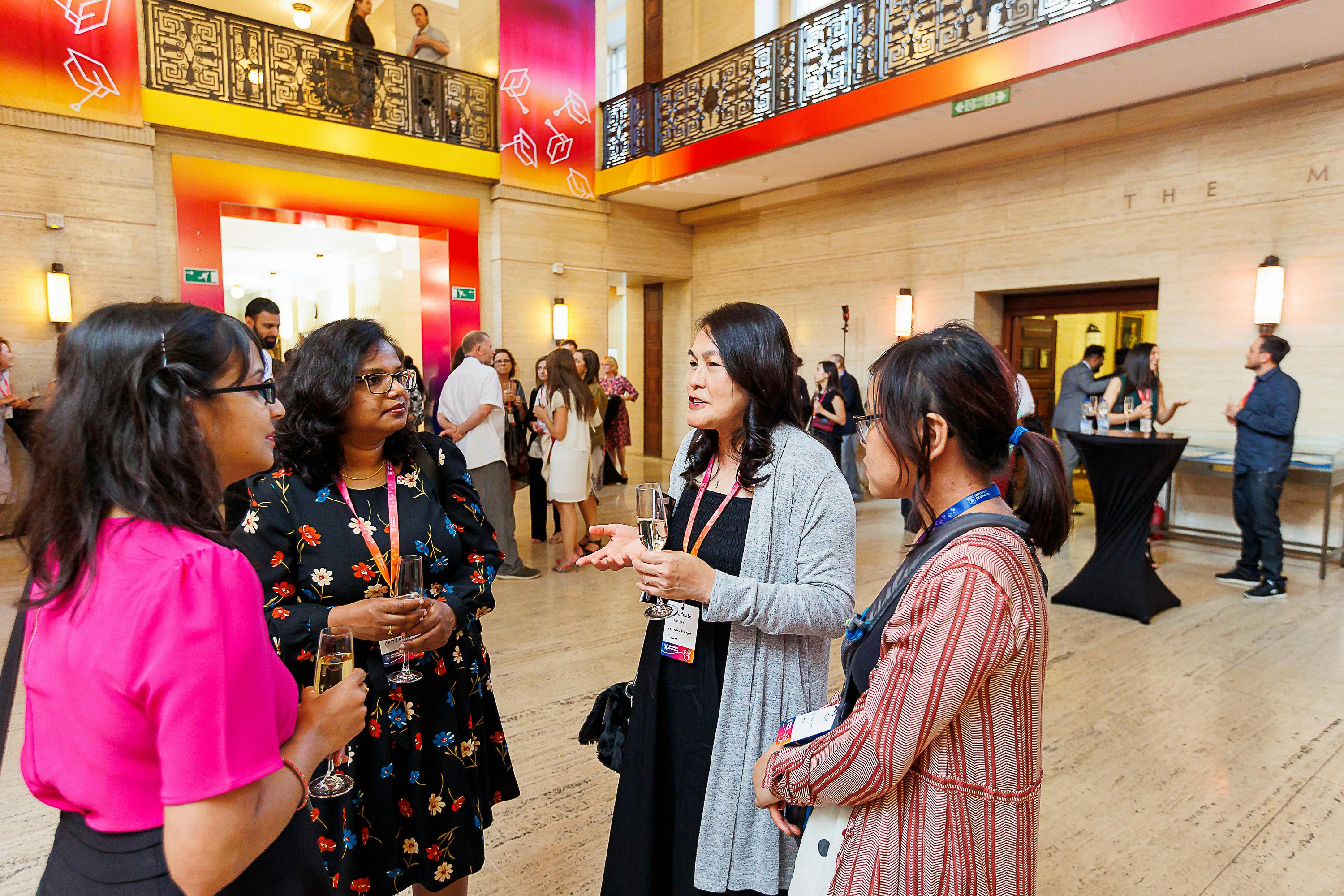 Vibrant networking event at Crush Hall, University of London, with engaged professionals.