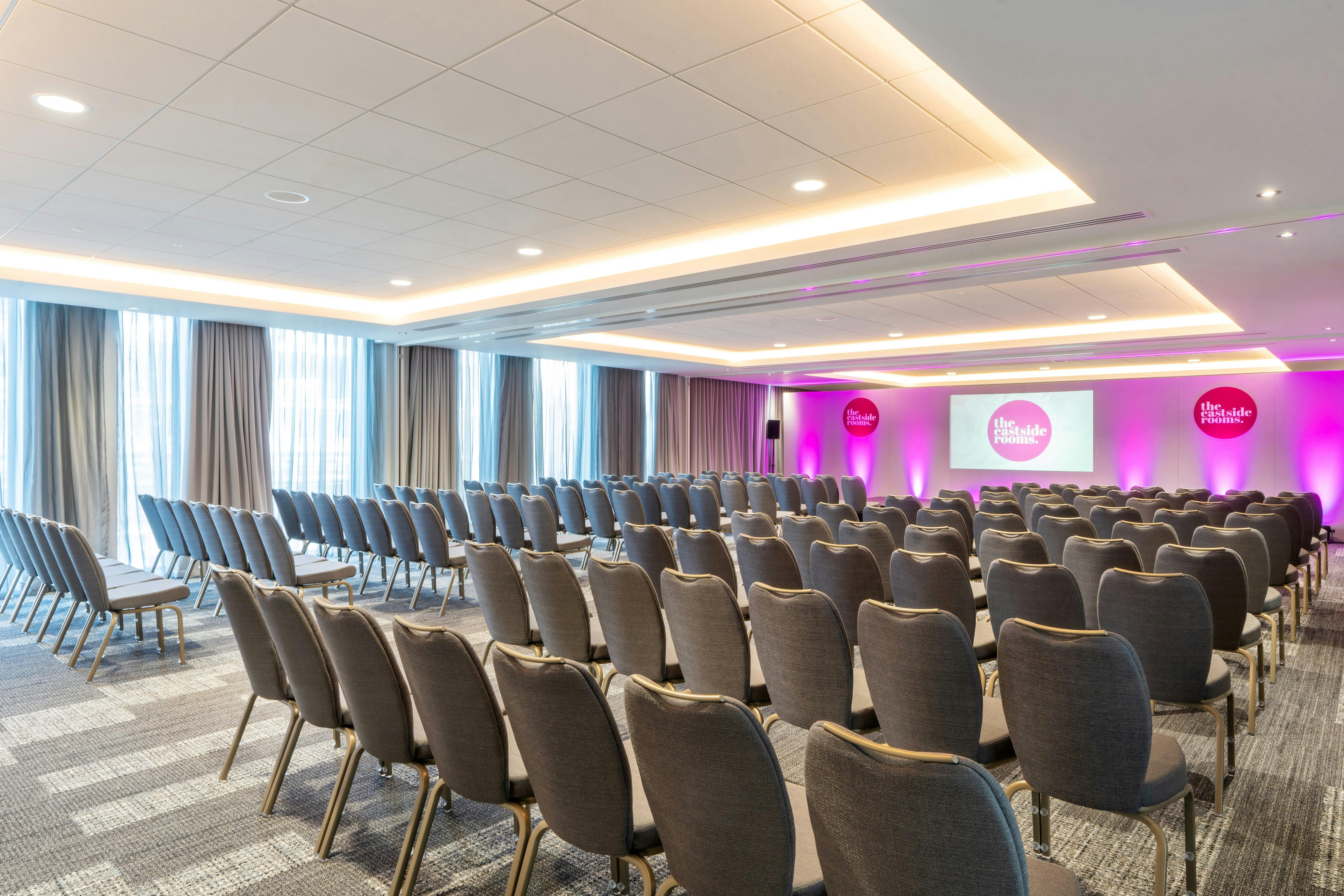 Ashtead One event space with seating for corporate presentations and conferences.