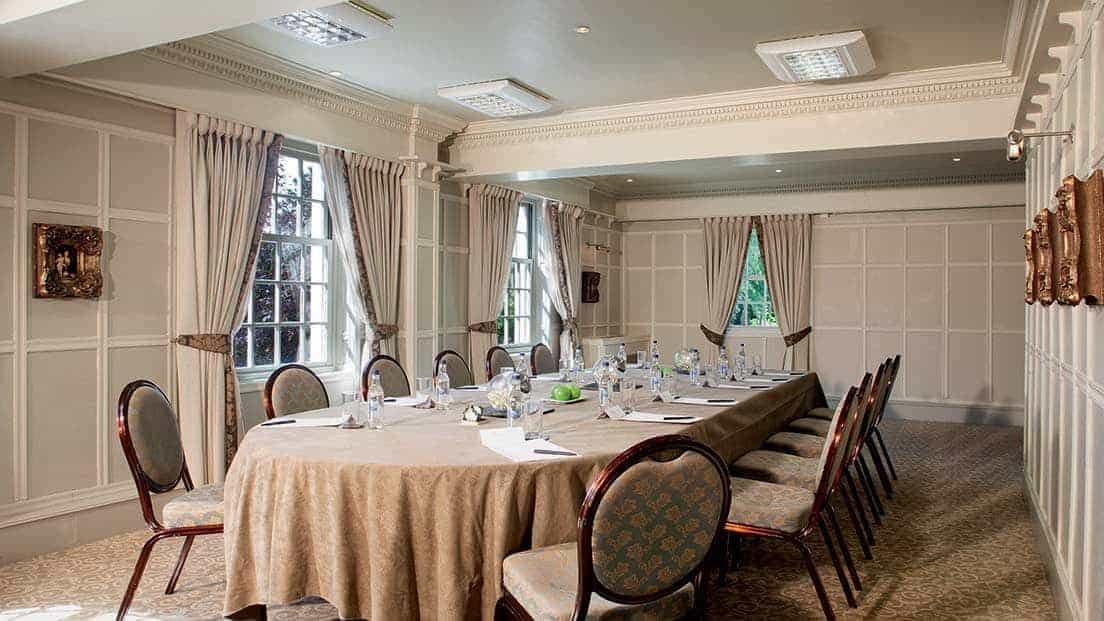 Elegant meeting room at Brandshatch Place Hotel, perfect for corporate events.