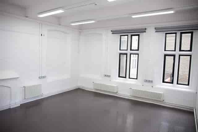 Bright, blank meeting space at Chesterfield College for workshops and conferences.