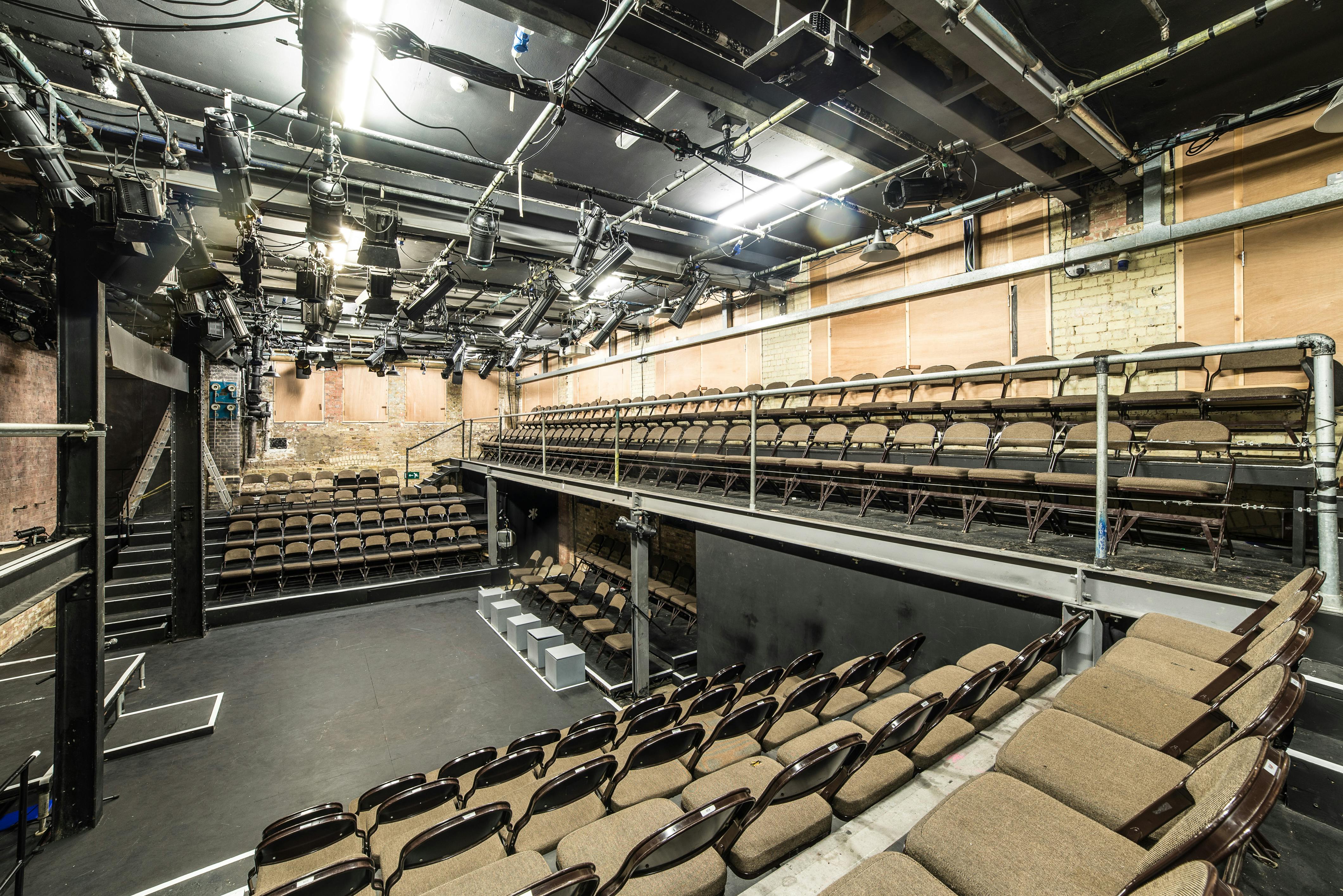 Versatile Arcola Theatre Studio 1 with tiered seating for intimate performances and workshops.