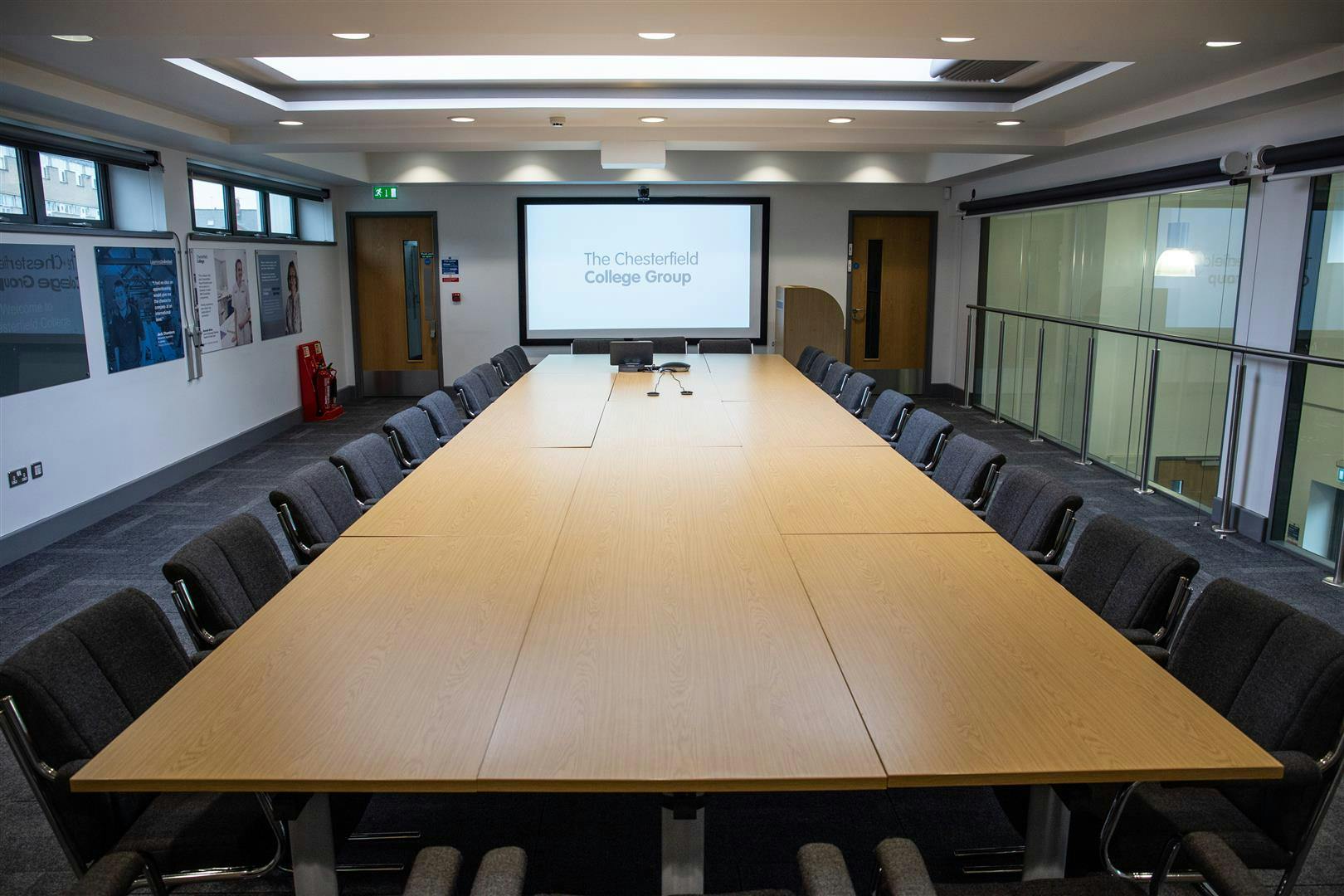 Modern conference room at Chesterfield College with ergonomic chairs for meetings.