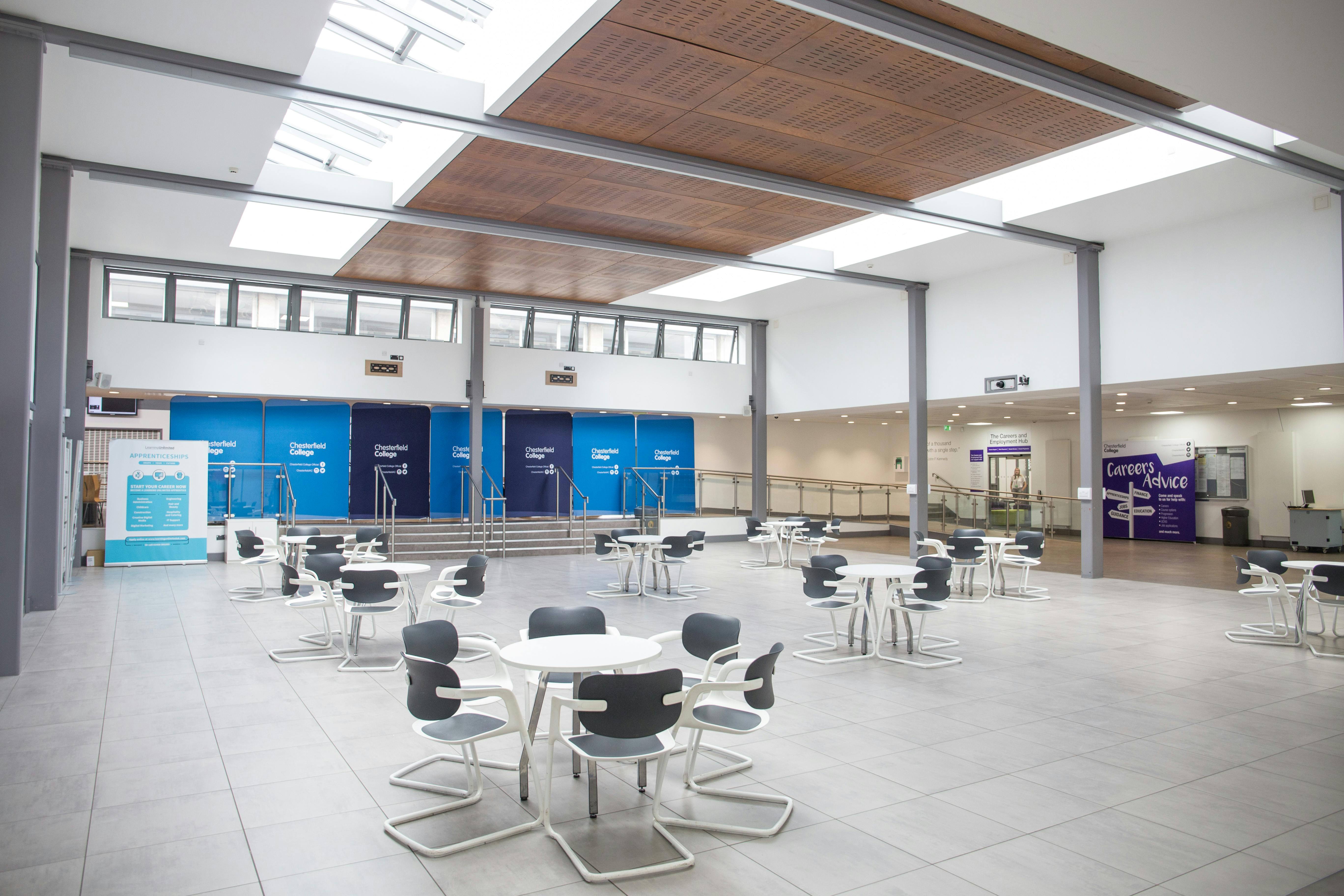 Heartspace at Chesterfield College: spacious event venue with modern seating for networking.