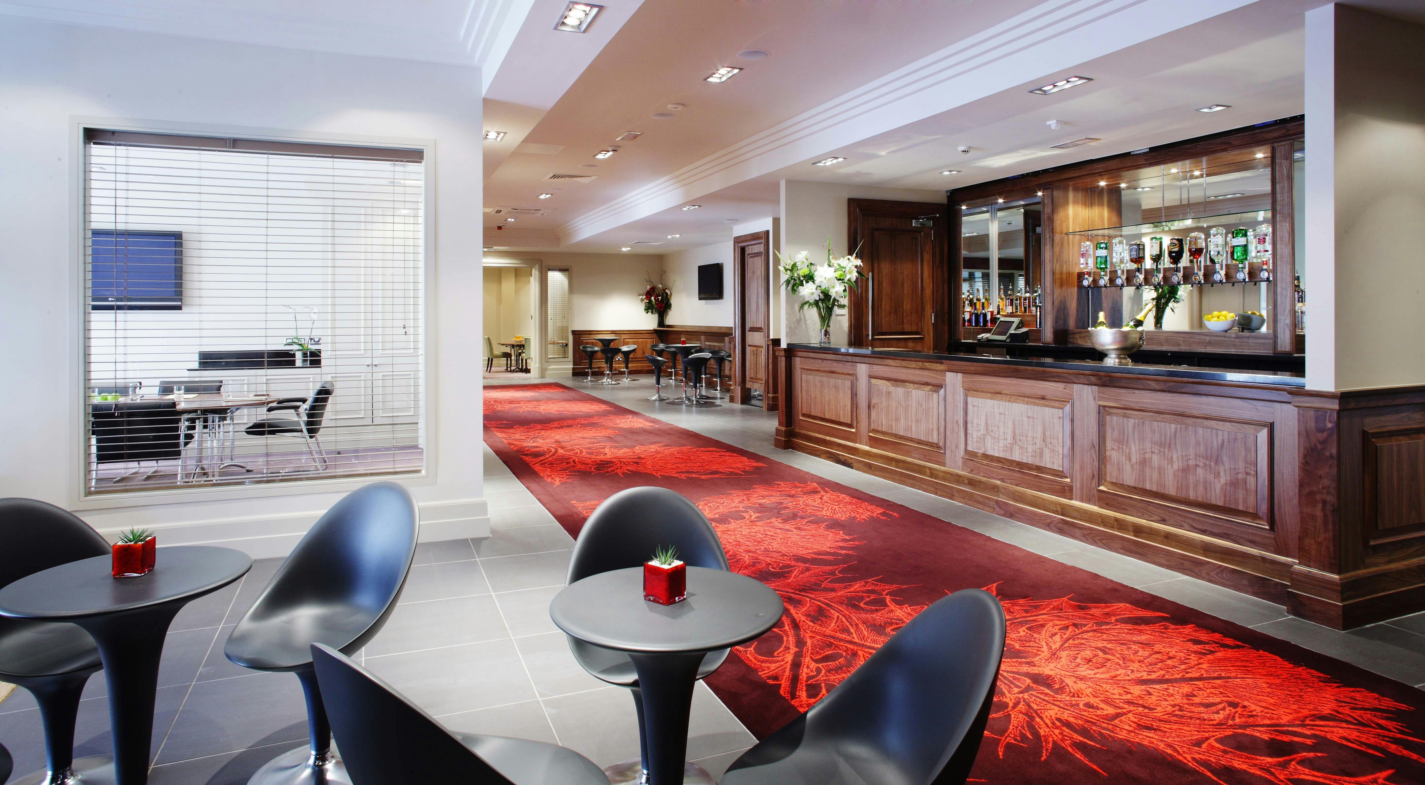 Ballroom Suite lobby at The Bristol, modern seating for events and meetings.