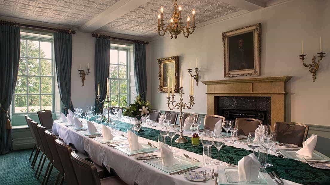 Elegant dining room at Chilston Park Hotel, perfect for formal dinners and corporate events.