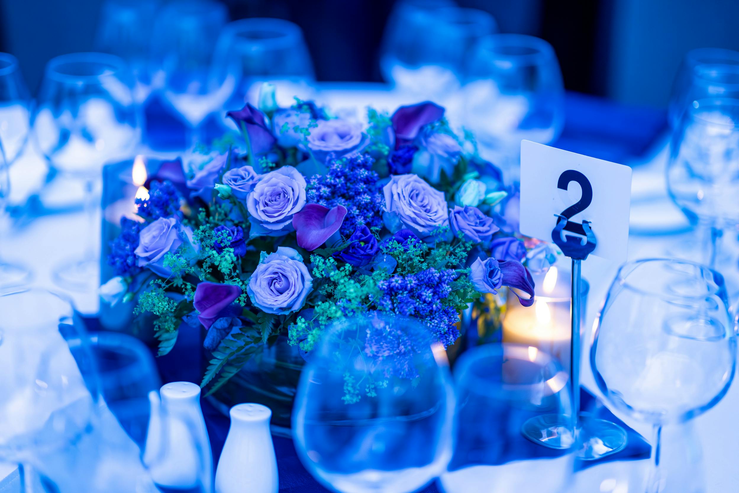 Elegant dining table with floral centerpiece at University of London event venue.