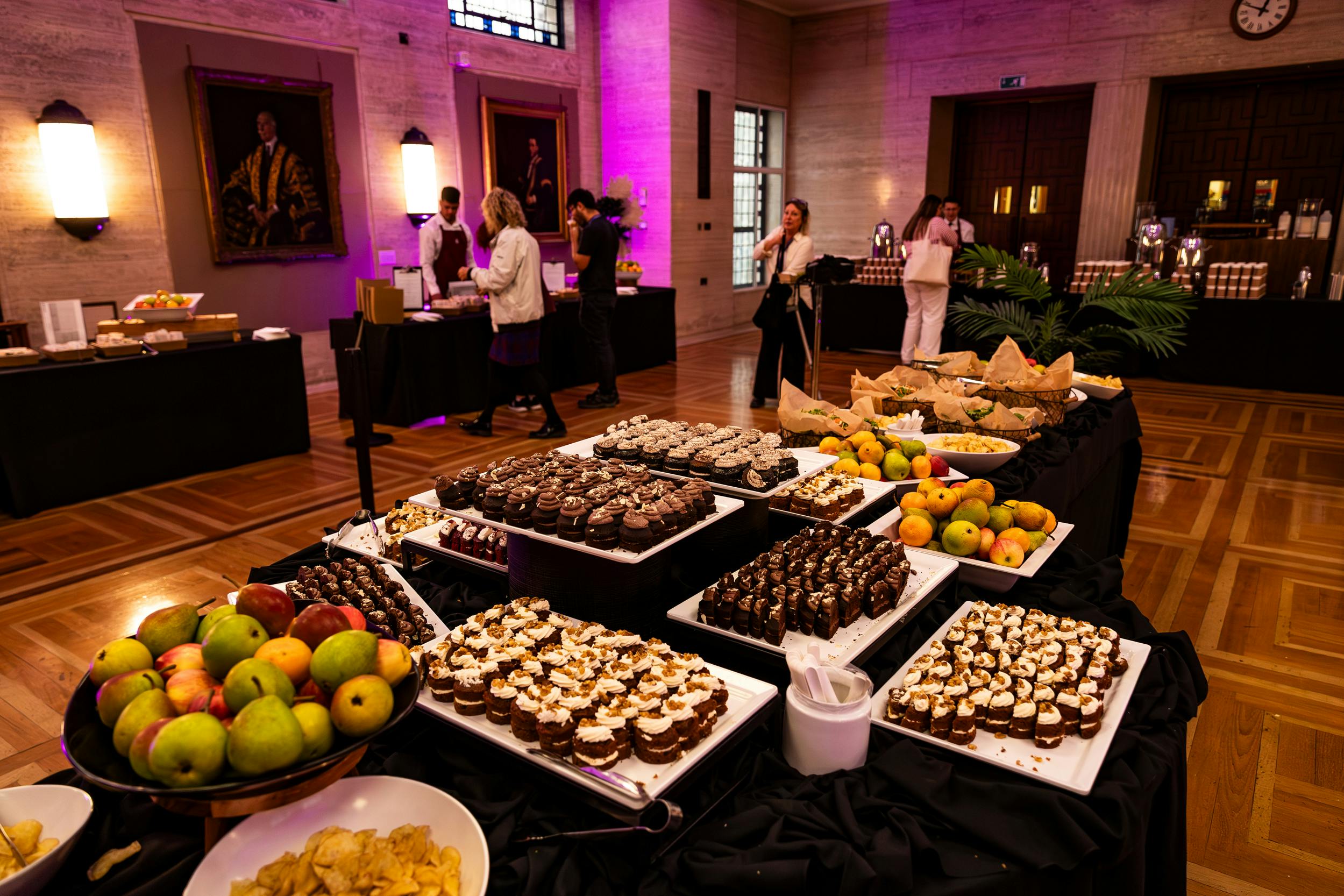 Elegant buffet setup with desserts at MacMillan Hall, perfect for networking events.