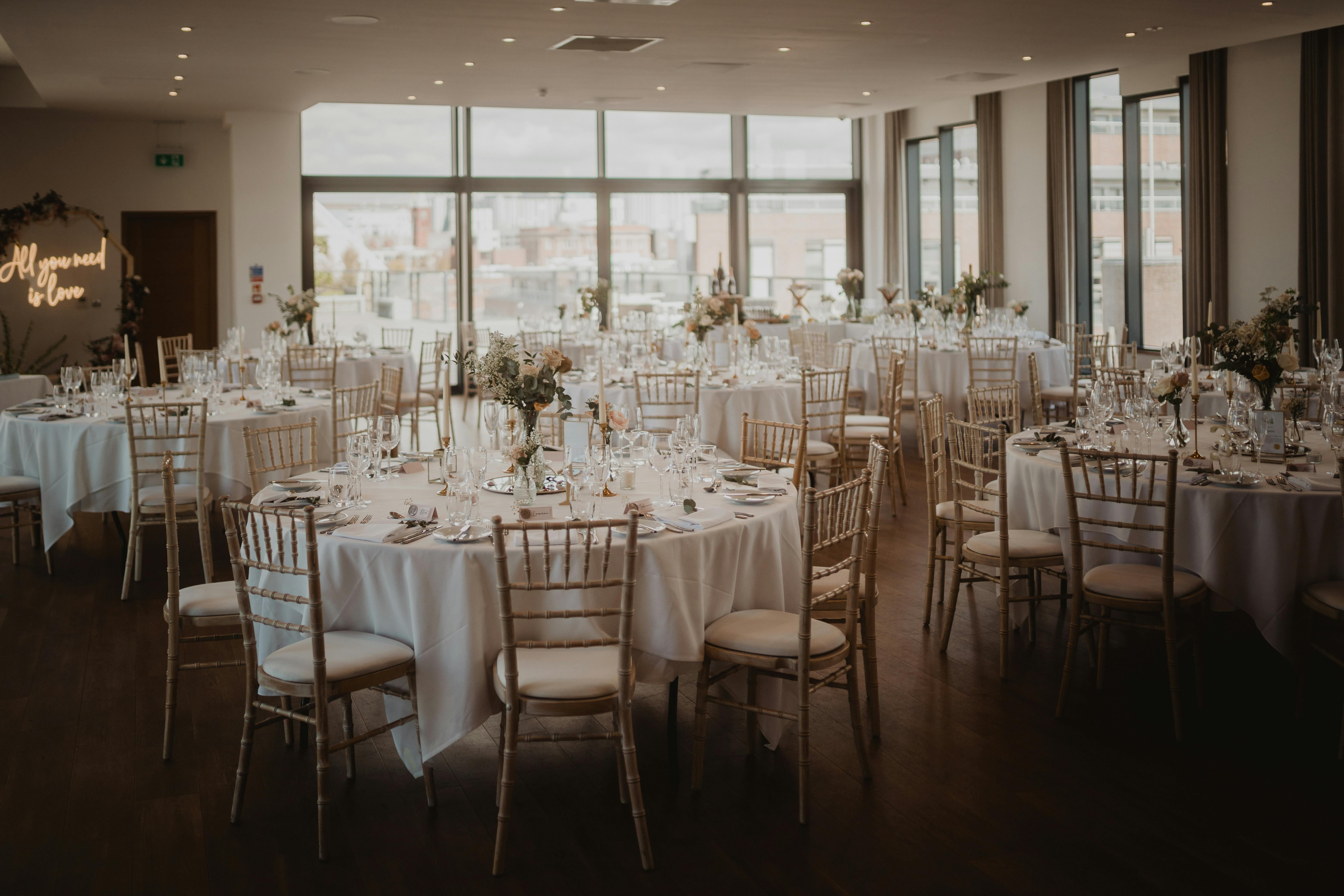 Elegant event space at Hope Street Hotel, ideal for weddings with floral centerpieces.