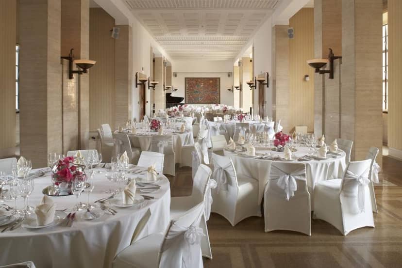 Chancellor's Hall banquet setup with floral centerpieces for weddings and corporate events.