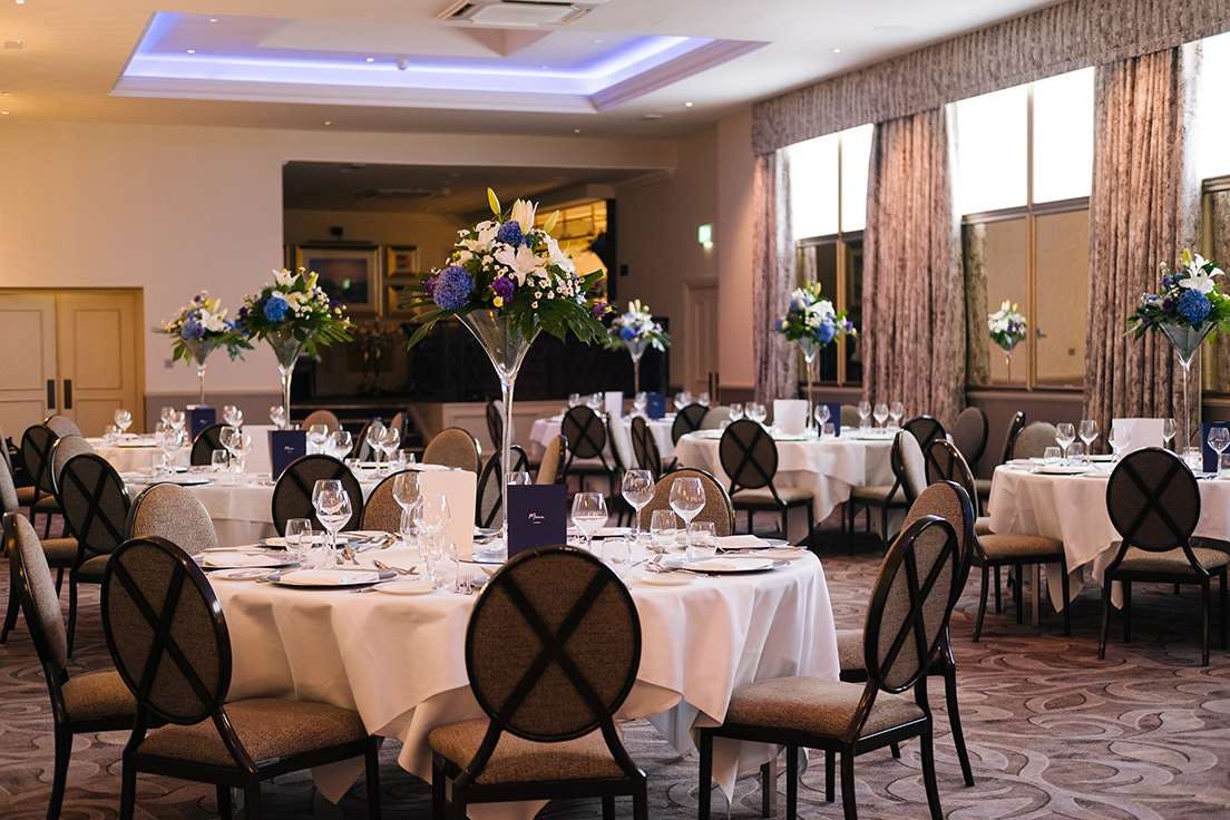 Elegant banquet room at Grand Jersey Hotel, perfect for weddings and corporate events.