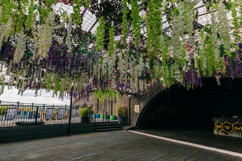 Indoor Roof Terrace at XOYO Birmingham with floral decor for weddings and corporate events.