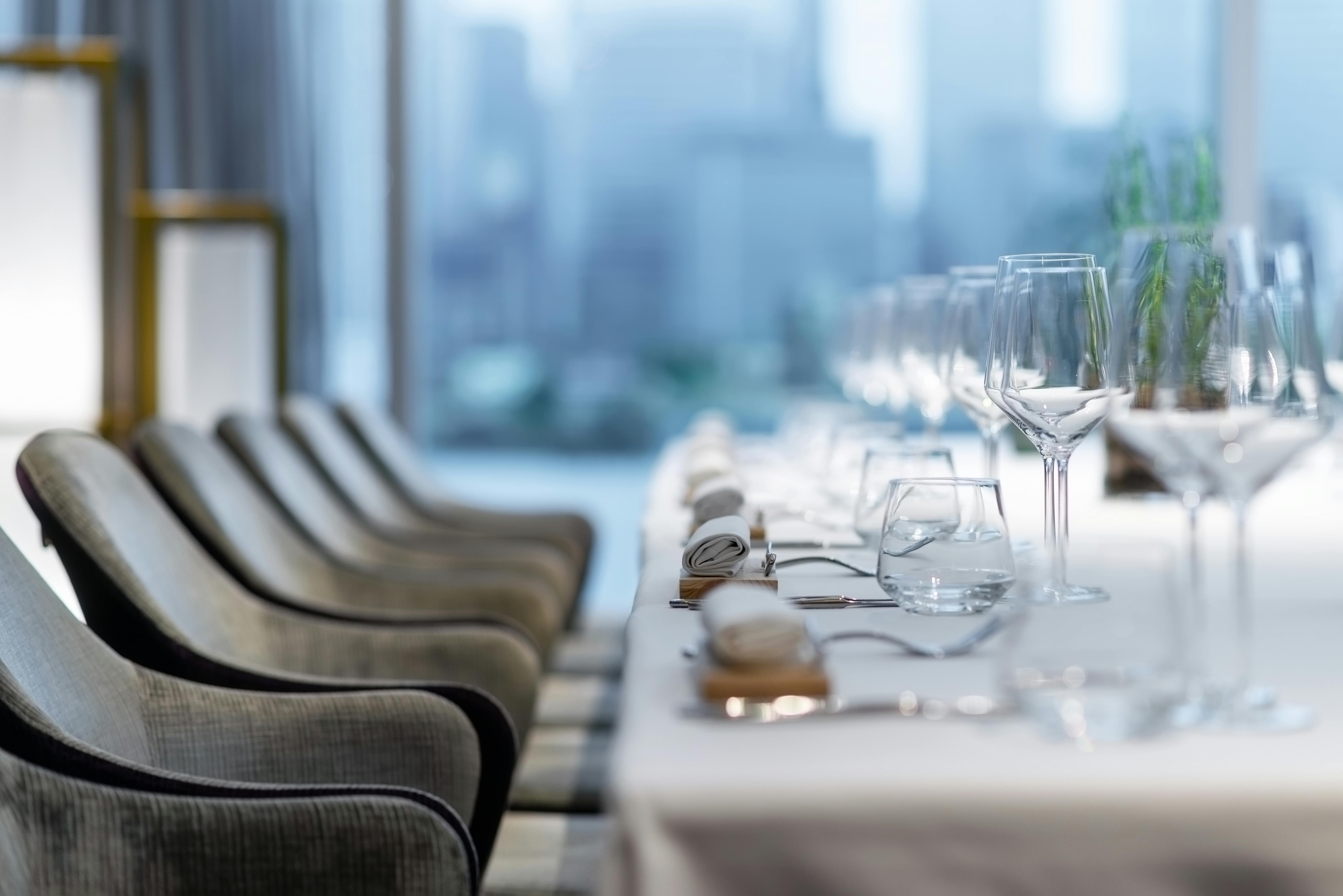 Sophisticated dining setup at Peninsula Private Dining, ideal for corporate events and meetings.