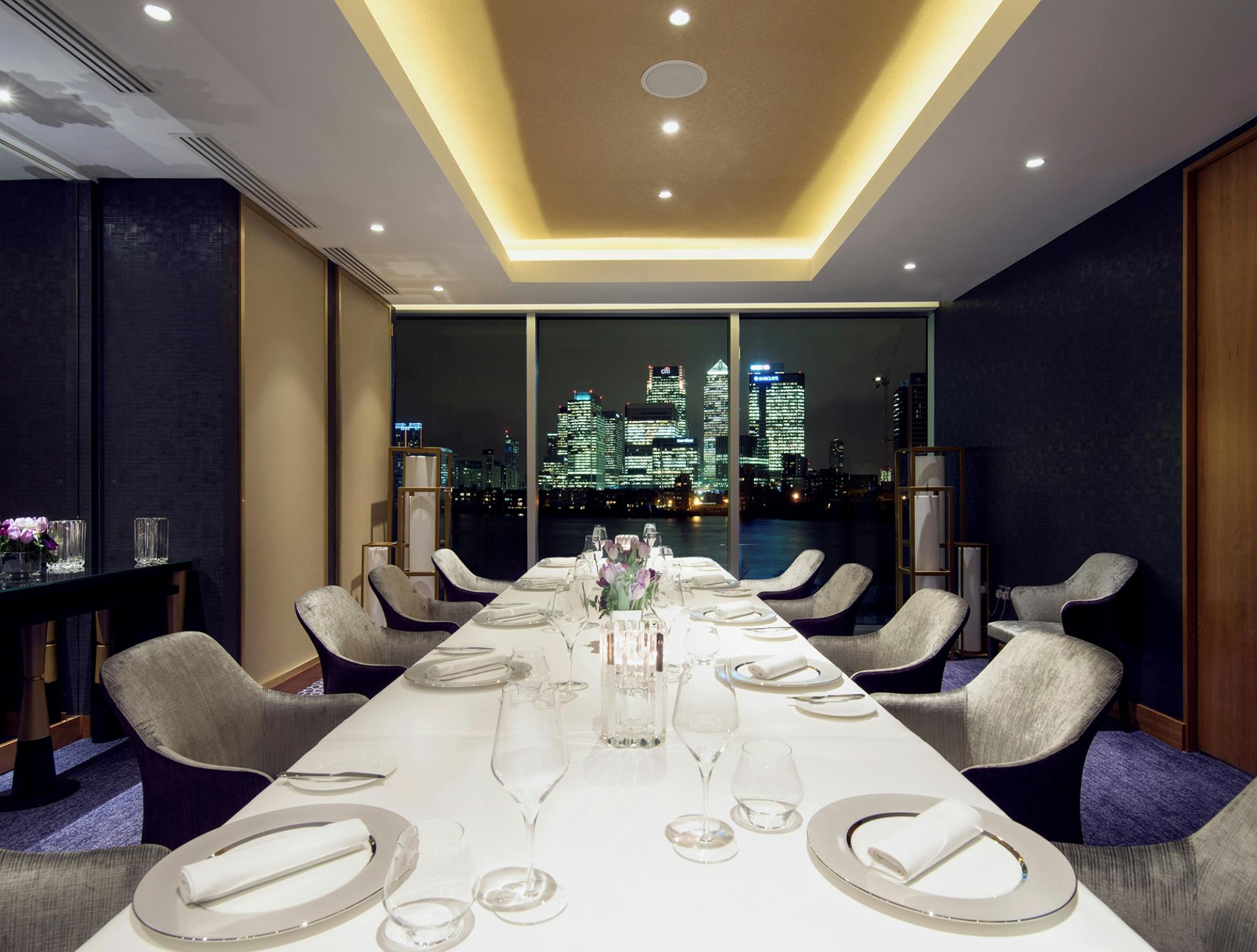 Elegant dining space at Peninsula Private Dining, ideal for corporate events and meetings.