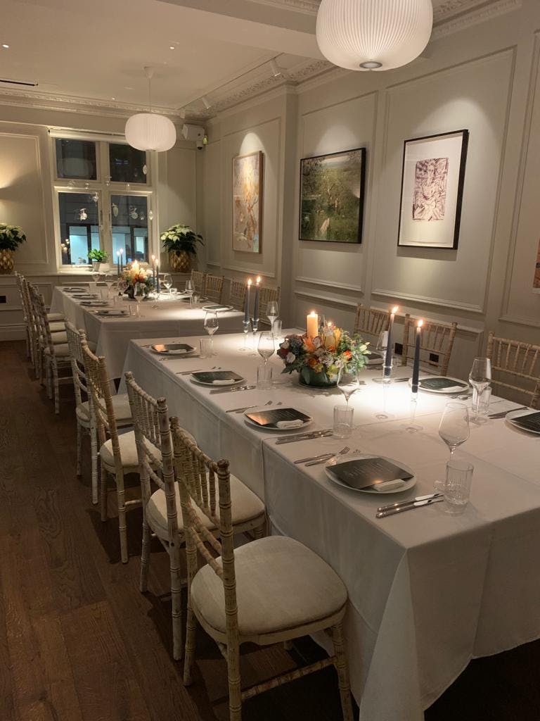 Elegant dining room at AllBright Mayfair, ideal for corporate dinners and gatherings.