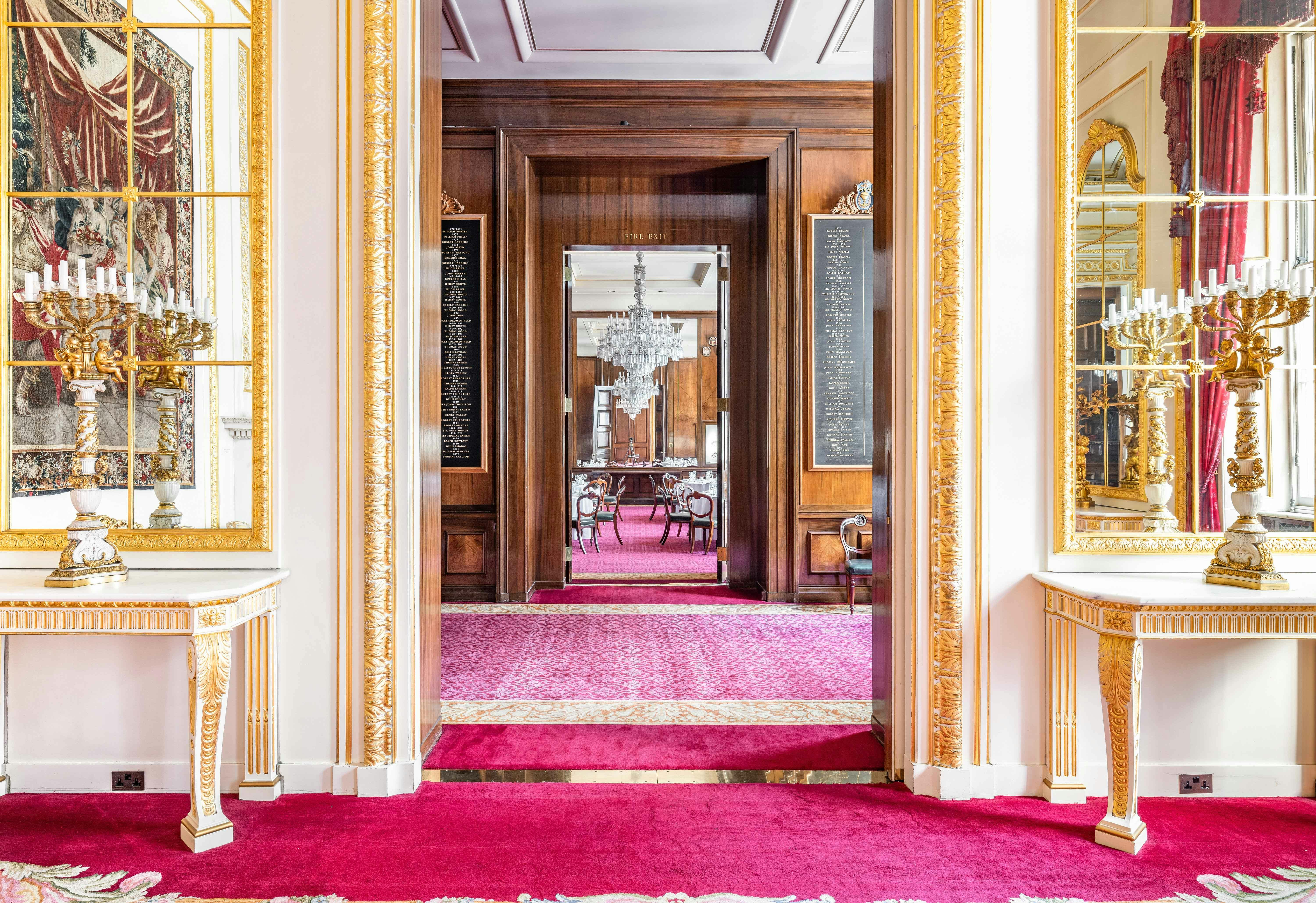 Elegant Drawing Room at Goldsmiths' Hall, featuring ornate mirrors for corporate events.