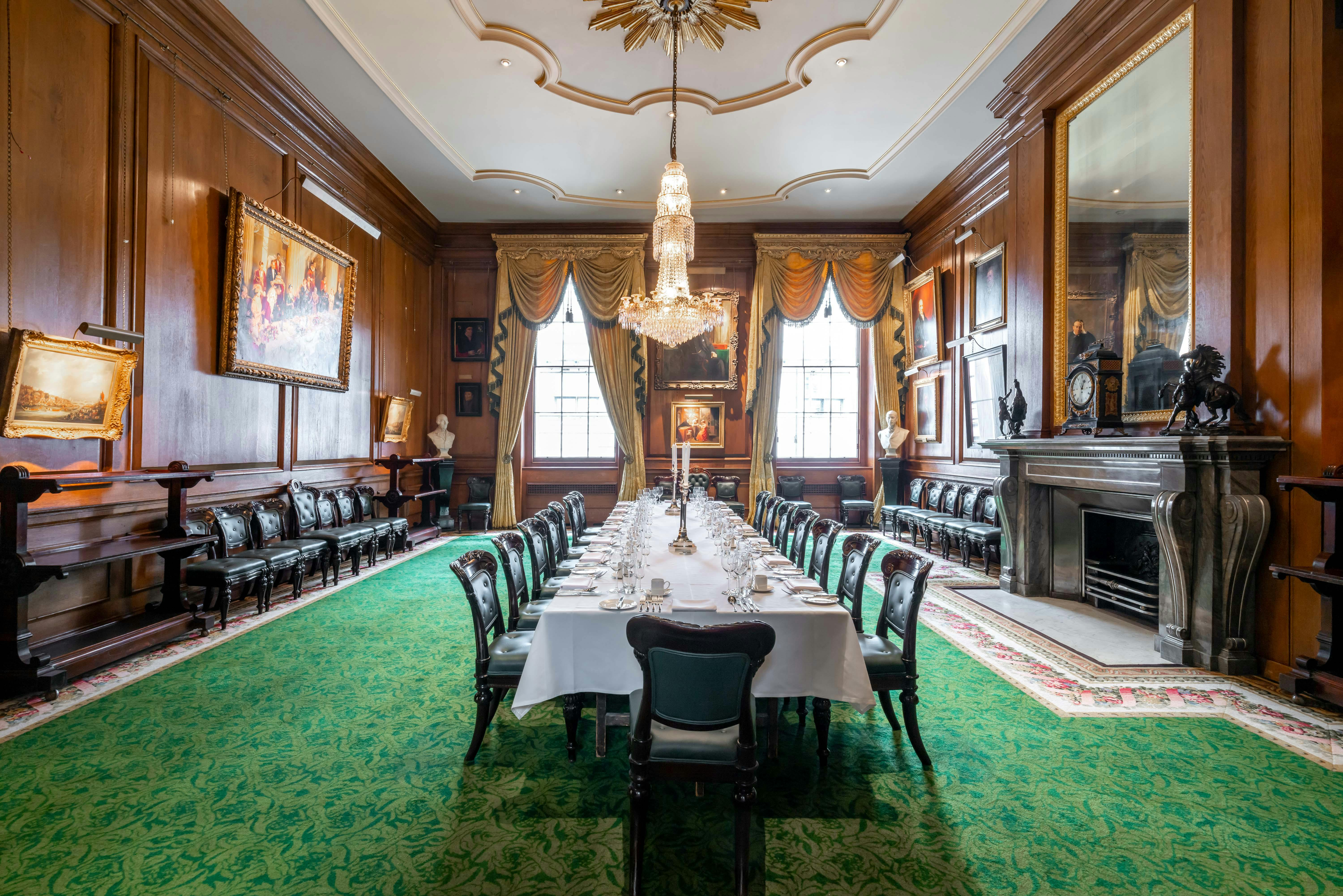 Elegant Luncheon Room at Goldsmiths' Hall, featuring a formal dining table for events.