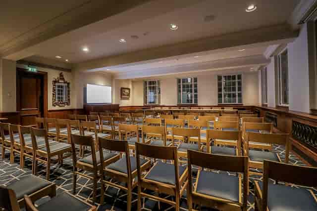 Meeting room at Court Suites, 87 Barts Close, ideal for presentations and seminars.