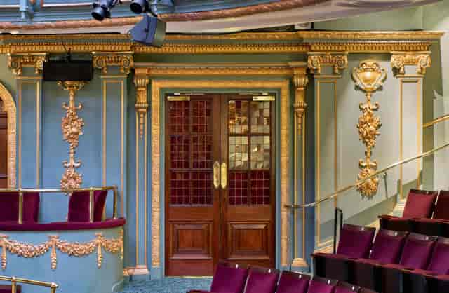 Aldwych Theatre Auditorium entrance with ornate design, ideal for galas and meetings.